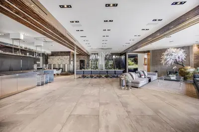 a large lobby with a couch and a table at Bali Inspired Villa in Sunset Plaza in Los Angeles