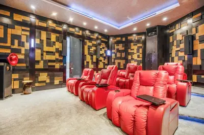 a room with a bunch of red chairs in it at Bali Inspired Villa in Sunset Plaza in Los Angeles