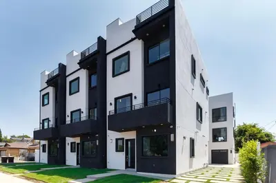 an apartment building with black and white at Luxury Modern 4 Bed 4 Bath Home with Rooftop Deck #6 in Los Angeles