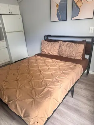 a bed in a room with a bedspread on it at Cozy Studio, Studio City Unit 2 in Los Angeles