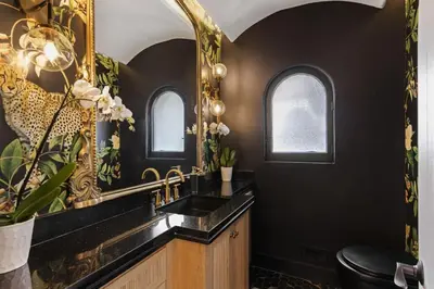 a bathroom with a sink and a mirror at One of Kind Ultra Luxury Beverly Hills Estate in Los Angeles