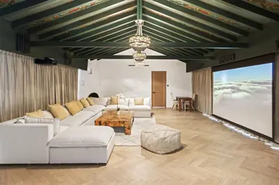 a living room with a couch and a table at One of Kind Ultra Luxury Beverly Hills Estate in Los Angeles