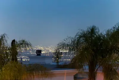 a view of a city at night with lights at Luxury Jupiter Estate with 4BR with Pool and Jacuzzi in Los Angeles