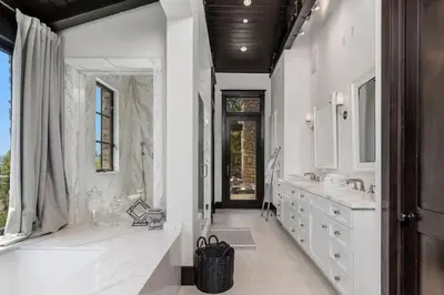 a bathroom with two sinks and a large mirror at Summitridge Bev Hills Villa with Pool, Spa, Roof Deck in Beverly Hills