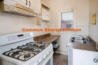a kitchen with a stove and a sink at Sleek Studio Near Downtown LA • AC • WiFi • Snacks in Los Angeles