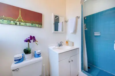 a bathroom with a sink and a toilet and a shower at Sleek Studio Near Downtown LA • AC • WiFi • Snacks in Los Angeles