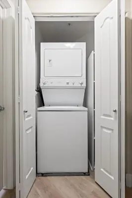 a white refrigerator with its door open in a kitchen at Great 2bd 2bath in MdR! Free parking and pool! in Los Angeles