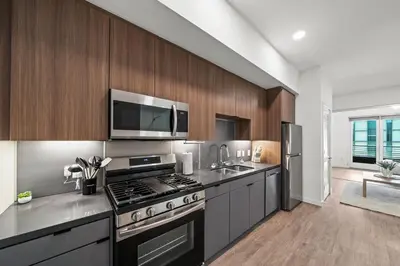 a kitchen with a stove and a microwave at Cozy Beachside Escape with Great Views in Long Beach