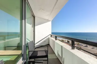 a balcony of a building with a view of the ocean at Gorgeous Malibu Retreat with #Instaworthy Ocean Views in Malibu Beach