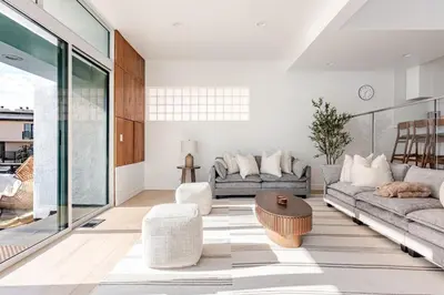 a living room with a couch and a table at Gorgeous Malibu Retreat with #Instaworthy Ocean Views in Malibu Beach
