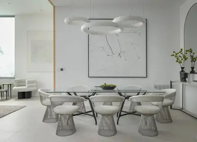 a dining room with a table and chairs at Luxury Beachfront Villa W. Stunning Pacific Views in Malibu