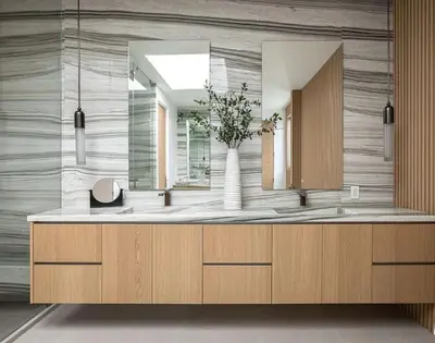 a bathroom with a large sink and a mirror at Luxury Beachfront Villa W. Stunning Pacific Views in Malibu