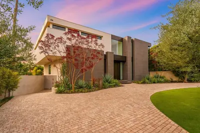 a house with a brick driveway in front of it at Ultra Luxurious Villa in the Beverly Hills Flats in Los Angeles
