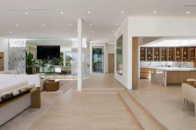 a living room with a couch and a table at Ultra Luxurious 5BR Villa W. Pool, Jacuzzi, Views in Los Angeles