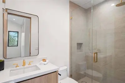 a bathroom with a shower and a sink and a toilet at Stunning 5BR in Studio City W. Pool, and Jacuzzi in Los Angeles