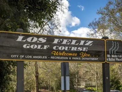 a sign for a golf course in a park at Cozy and Calm Retreat in Heart of Glendale in Glendale