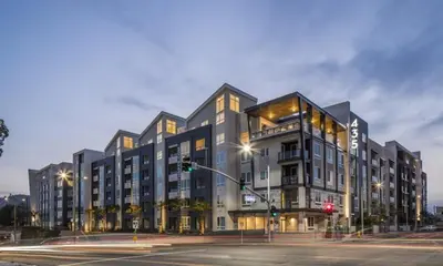 a large building on a city street at night at Cozy and Calm Retreat in Heart of Glendale in Glendale