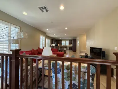 a living room with a couch and a television at Shopping at Arcadia Mall, Homes, School District, Comfortable Home on Huntington Road in Arcadia
