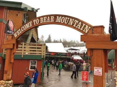 a welcome to bear mountain sign over a market at Luxury 4 Bedroom Home Pool Big Yard San Bernardino in San Bernardino