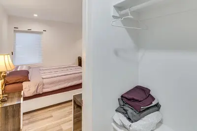 a bedroom with a bed and a closet at Luxury guest suite in Los Angeles in North Hills
