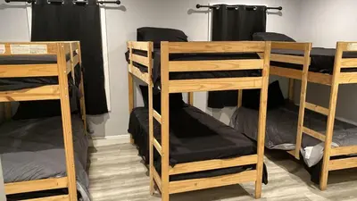 a group of bunk beds in a room at Santa Ana Vibes in Santa Ana