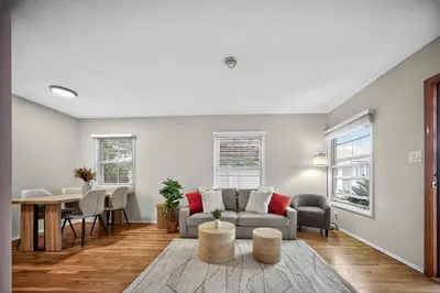 a living room with a couch and a table at Luxury Cozy 2BR 1BA near LAX, LMU, SoFi Stadium, Beach in Los Angeles