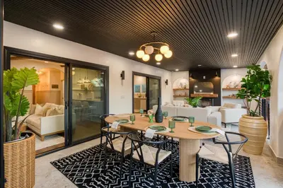 a dining room with a table and chairs at Exclusive Disney Resort- Private Pool & Luxe Stay in Anaheim