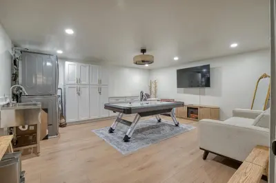 a living room with a ping pong table in it at Exclusive Disney Resort- Private Pool & Luxe Stay in Anaheim