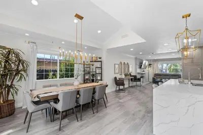 a kitchen and dining room with a table and chairs at Wonderful Home Near Claremont! With Amazing Backyard! in Pomona