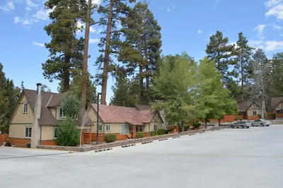 a row of houses in a parking lot at Bear Creek Resort in Big Bear Lake