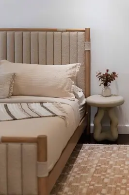 a bedroom with a bed and a side table at The W Hotel Residence With Roof Top Pool, Gym Plus 2 Free Valet Parking spaces in Los Angeles