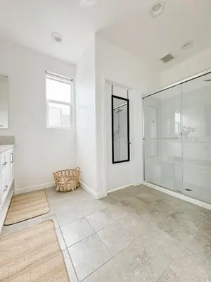 a white room with a glass shower in it at Central, Urban Townhouse with Private Roof Deck in Garden Grove