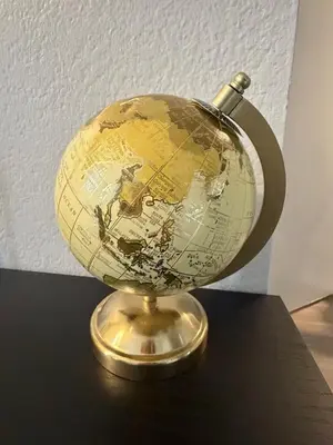 a globe sitting on top of a table at Steps from The Hollywood Walk of Fame in Los Angeles