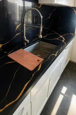 a kitchen counter with a sink in a kitchen at Kenmore relax in Los Angeles
