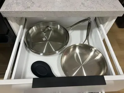 two pots and pans sitting on top of a stove at East Hollywood Modern Spacious Bungalow in Los Angeles