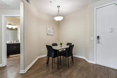 a dining room with a table and chairs at Cozy Marina Hideaway Gym Pool & Spa Central in Los Angeles