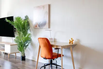 an office with a desk with a chair and a computer at Sleek Marina Den Central Gym Pool King Bed in Los Angeles
