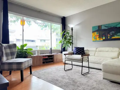 a living room with a white couch and chairs at Proper Stays at Melrose - West Hollywood Premium M suite in Los Angeles
