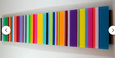 a colorful striped shelf with two white squares at Hillside Luxury MidCentury Modern Spa Retreat View in Los Angeles