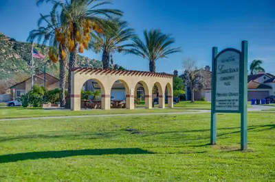 a sign in the grass in front of a park at Family Home with Hot Tub! 2 Mi to Dtwn Riverside in Riverside