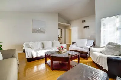 a living room with couches and a coffee table at Home 8 Mi to Dtwn Riverside Families Welcome! in Moreno Valley