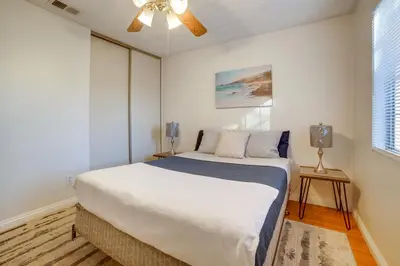 a bedroom with a bed and a ceiling fan at Home 8 Mi to Dtwn Riverside Families Welcome! in Moreno Valley