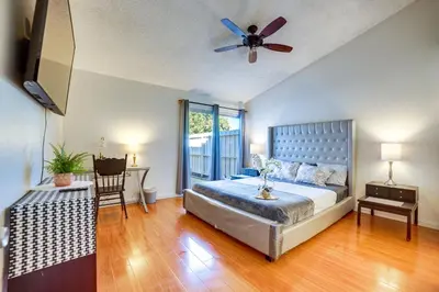 a bedroom with a bed and a ceiling fan at Home 8 Mi to Dtwn Riverside Families Welcome! in Moreno Valley