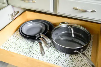 a kitchen sink with a pot and pans on it at Stylish Retreat Large Living Space & Bright Suites in Norwalk