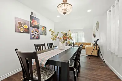 a dining room with a table and chairs at Cozy Full Suites Bright & Private Great Value in Norwalk