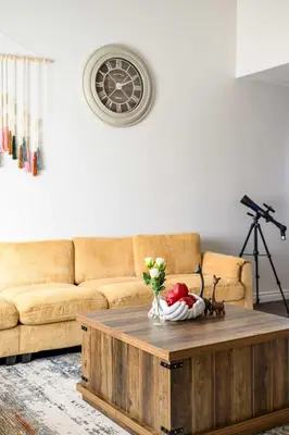 a living room with a couch and a coffee table at Cozy Full Suites Bright & Private Great Value in Norwalk