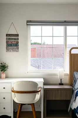 a bedroom with a white desk and a window at Cozy Full Suite Private Bathroom Quiet Stay in Norwalk