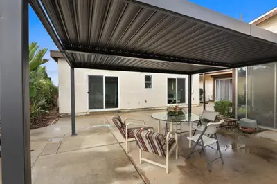 an open patio with a table and chairs at New Family House Fanstic View Azusa in Azusa