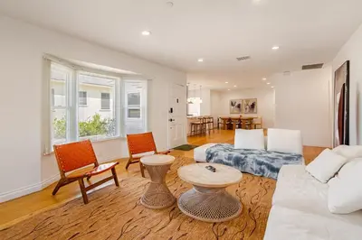 a living room with a couch and a table at Relaxing time in Pasadena in Pasadena