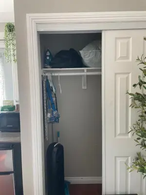 a closet with a door in a room at The stay go in Gardena